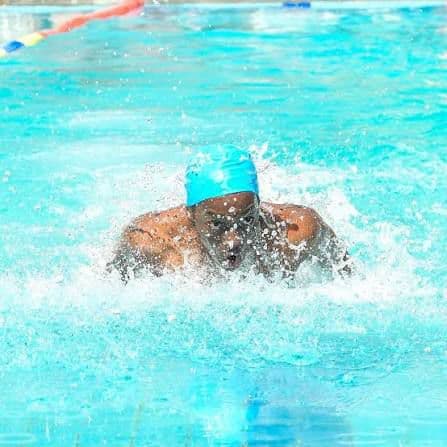 Precious Schools swimmer practising breaststroke